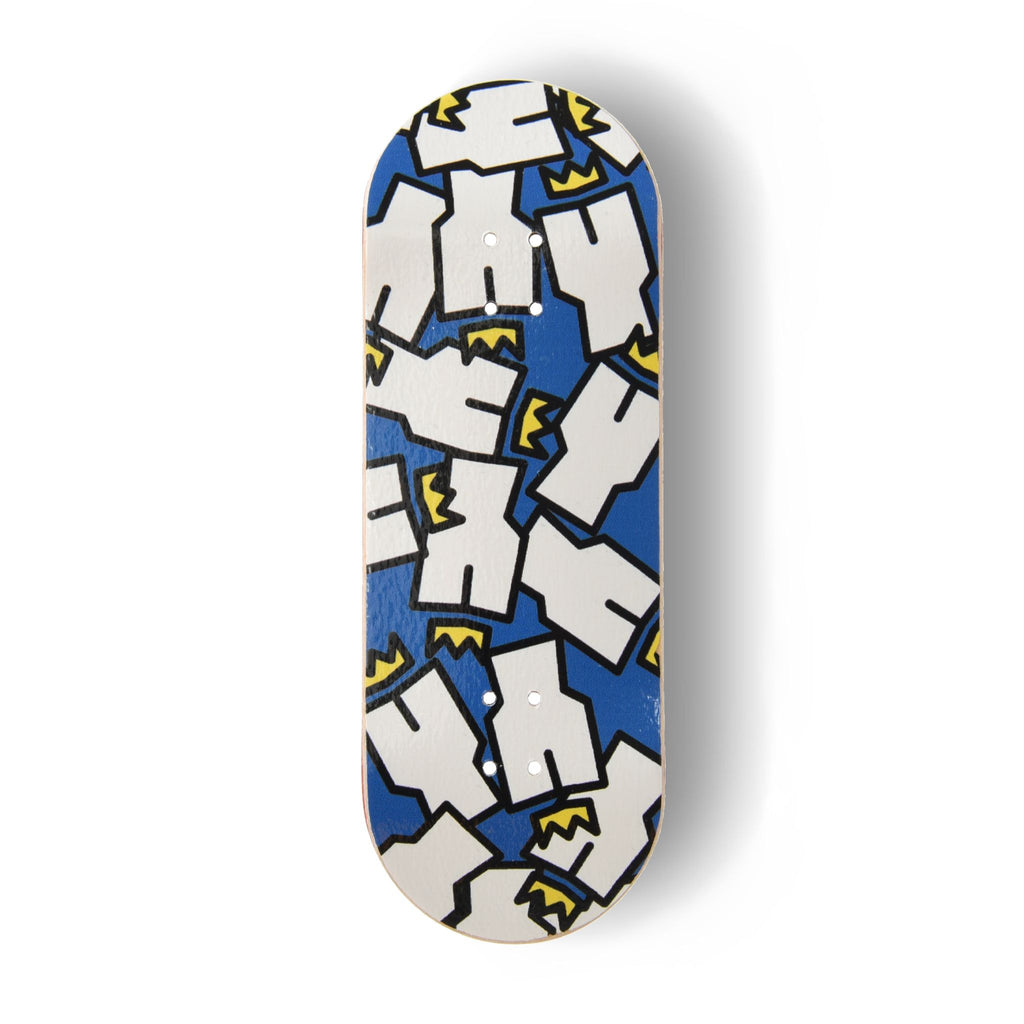 A Yurt fingerboard deck consisting of a 5-ply maple deck with a colourful Real Wear graphic design of the Yurt Crowns logo on a Blue background. 