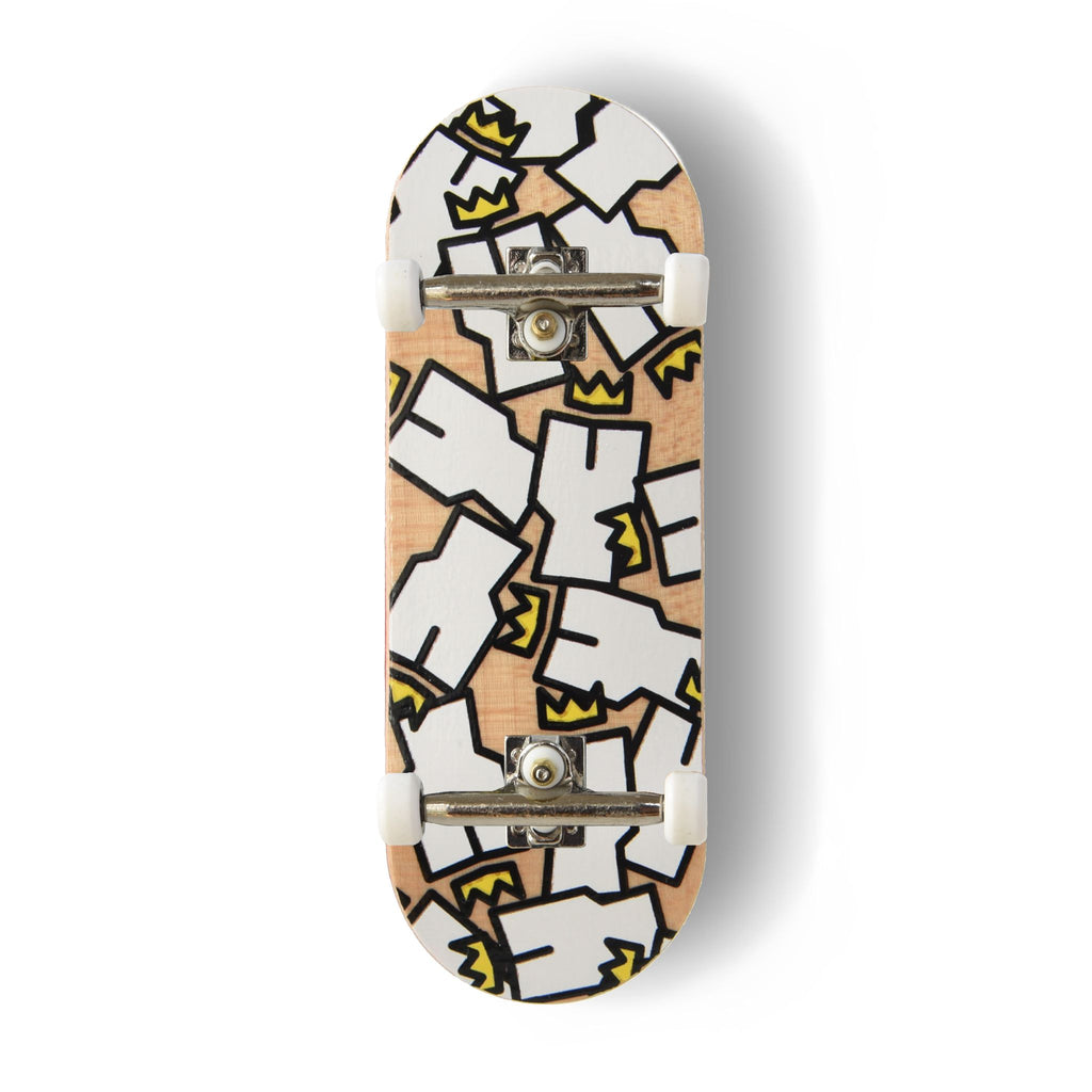 A Yurt fingerboard complete with silver trucks and white wheels, consisting of a 5-ply maple deck with a colourful Real Wear graphic design of the Yurt Crowns logo with a Natural wood background. 