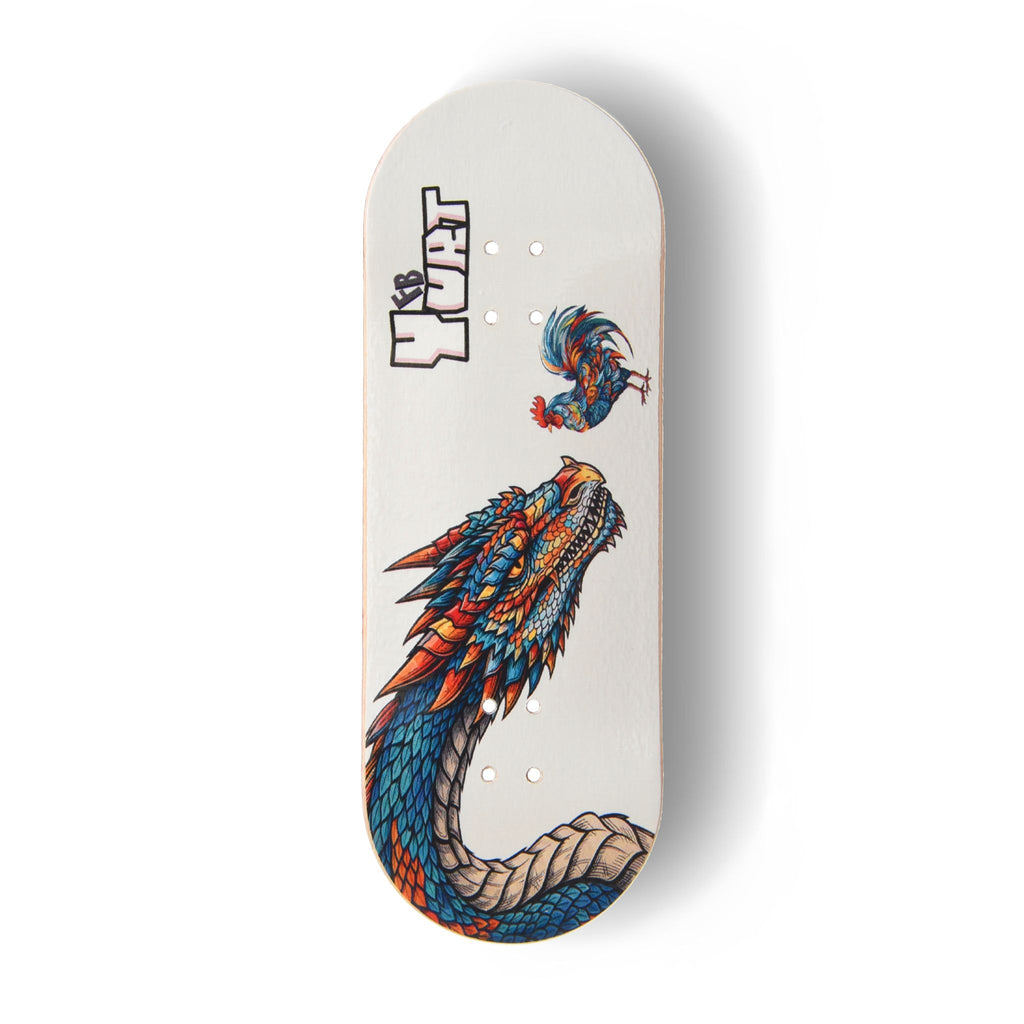 A Yurt fingerboard deck consisting of a 5-ply maple deck with a colourful Real Wear graphic design with a blue and red chicken and dragon on a white background.