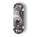 A Yurt fingerboard complete with silver trucks and white wheels, consisting of a 5-ply maple deck with a Real Wear graphic design featuring a black and white fractal spiral design, on a clean white background.