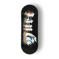 A Yurt fingerboard deck consisting of a 5-ply maple deck with a colourful Real Wear graphic design with a black background, large white gothic-style lettering spelling out 'Yurt', and a graphic in green, blue, and red, shown on a white background.