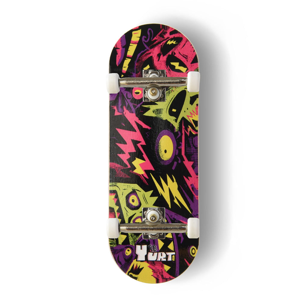 A Yurt fingerboard complete with silver trucks and white wheels, consisting of a 5-ply maple deck with a colourful Real Wear graphic design with a cohort of pink, green, yellow and purple monsters on a black background. 