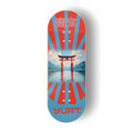Yurt fingerboard deck consisting of a 5-ply maple deck with a colourful Real Wear graphic design featuring a Japanese torii gate over water design with red and blue sunburst rays, shown on a white background.